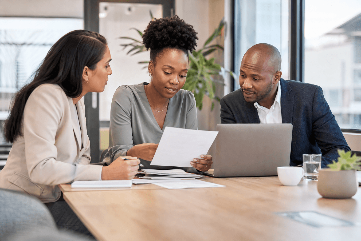 A South African small business team reviewing their business plan together